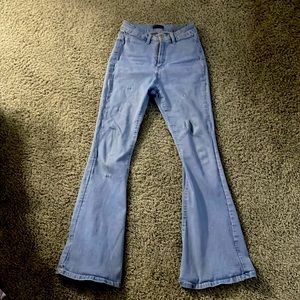 Light blue bell bottom jeans (alittle worn)